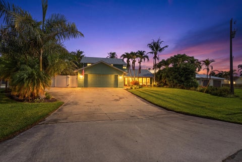 Photo of 1489 SW Seahawk Way, Palm City, FL 34990 (MLS # B26050536)