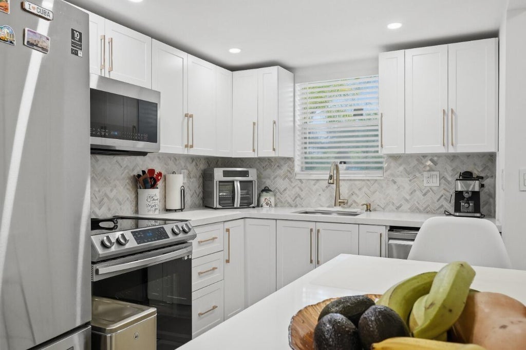 Photo of 6100 NW 44TH Street #104, Lauderhill, FL 33319 (MLS # B26066485)