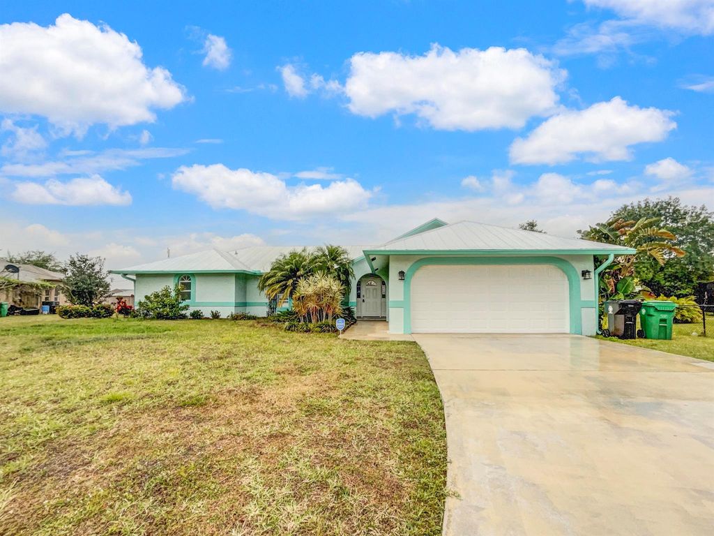 Photo of 4404 SW Grace Court, Port Saint Lucie, FL 34953 (MLS # R10971924)