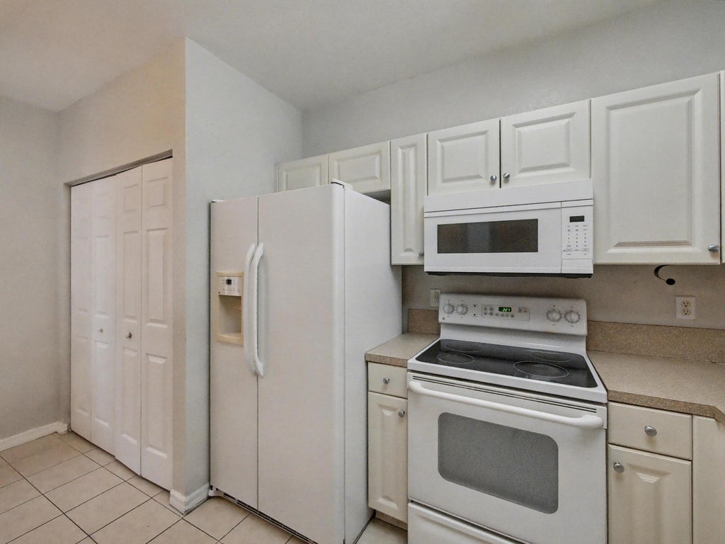 Photo of 3425 Sonoma Drive, Riviera Beach, FL 33404 (MLS # B26078760)