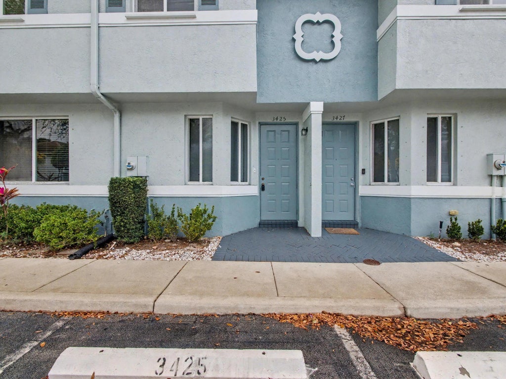 Photo of 3425 Sonoma Drive, Riviera Beach, FL 33404 (MLS # B26078760)