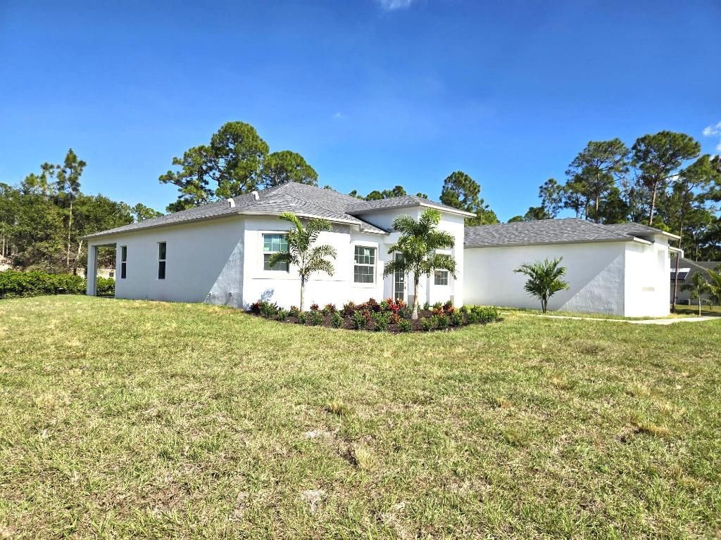Photo of 14749 68th Street N, The Acreage, FL 33470 (MLS # R11141865)