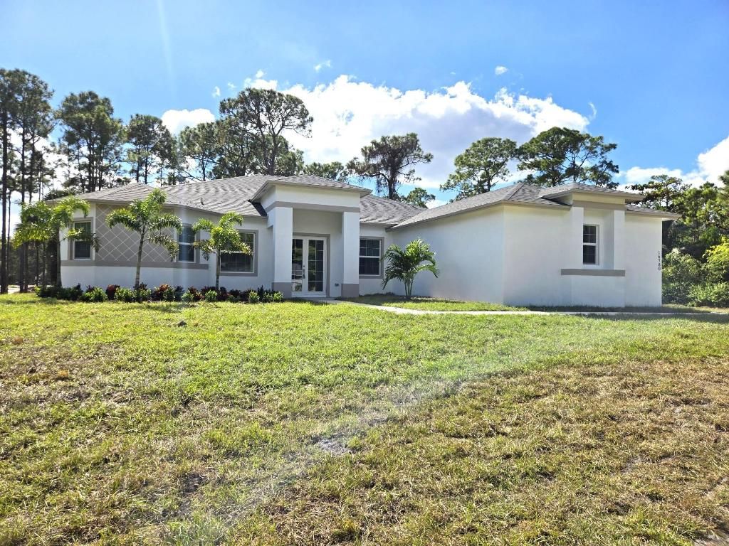 Photo of 14749 68th Street N, The Acreage, FL 33470 (MLS # R11141865)
