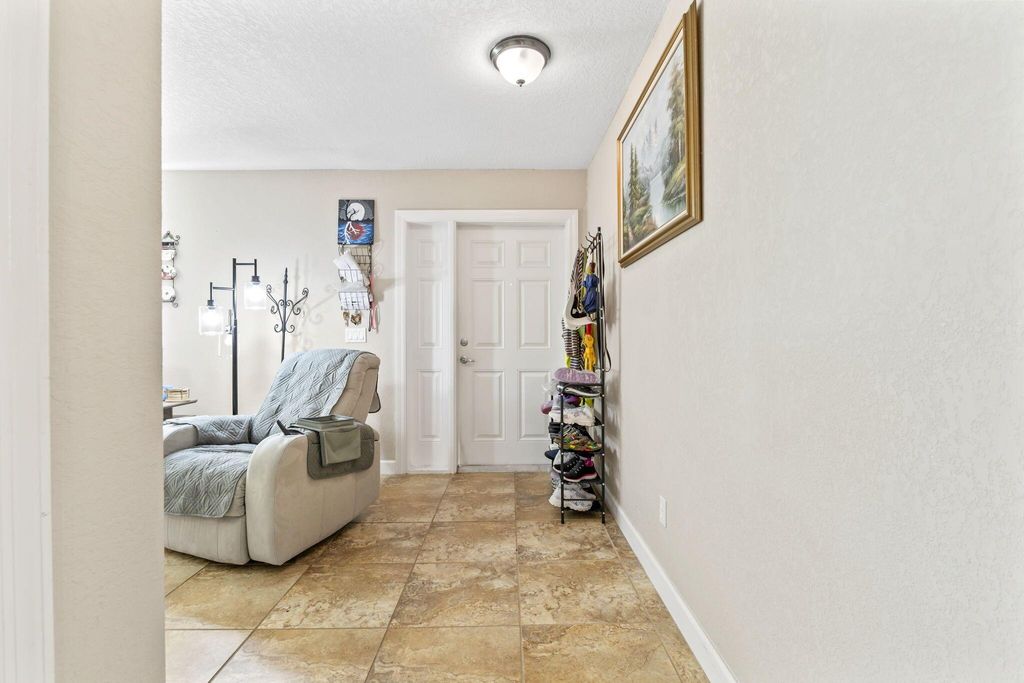 Photo of 1143 SE Sabina Lane, Port Saint Lucie, FL 34983 (MLS # R11085323)