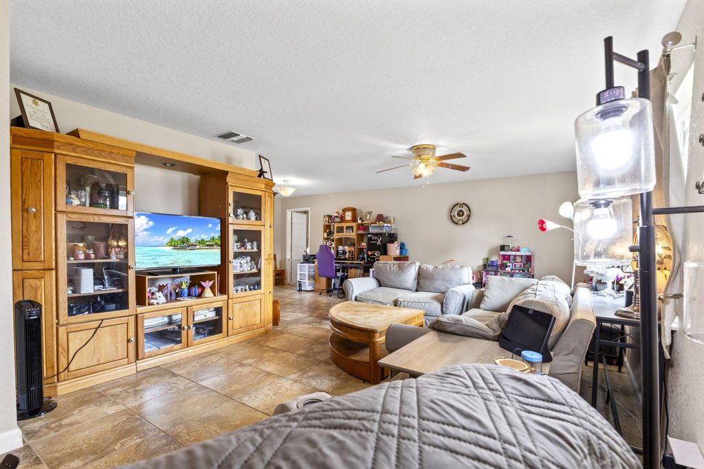 Photo of 1143 SE Sabina Lane, Port Saint Lucie, FL 34983 (MLS # R11085323)