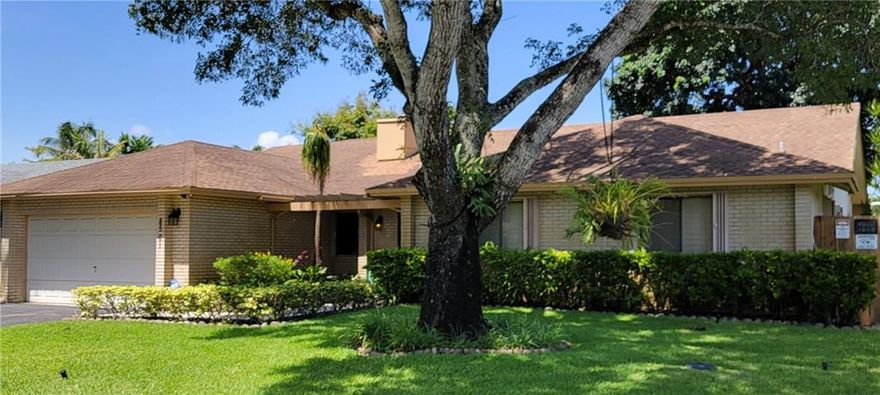 THIS IS THE ONE YOU HAVE WAITED FOR!PRIME DAVIE LOCATION. THE ORIGINAL OWNER HAS TAKEN IMPECCABLE CARE OF THIS PROPERTY. 3/2 WATERFRONT HOME WITH SPRAWLING TROPICAL BACKYARD AND GORGEOUS LAKE VIEWS . A/C 2017, 20KW GENERATOR 2017, HWH 2018. KITCHEN OPENS TO LARGE SCREENED DOUBLE PATIOS WITH WOOD CABINETS AND STUNNING VIEWS. SPACIOUS MASTER SUITE INCLUDES LARGE WALK IN CLOSET AND SPA-INSPIRED CABANA BATH THAT OPENS TO THE SPRAWLING PATIO. PLANTATION SHUTTERS THROUGHOUT, VAULTED WOOD BEAM CEILING IN THE LIVING AREA. WATER FILTRATION SYSTEM, WOOD BURNING FIREPLACE, AUTOMATIC SPRINKLERS AND ROOM FOR A POOL. NO HOA! ACCORDIAN HURRICANE SHUTTERS, IMPACT GARAGE DOOR 2018. FLOORING IS WOOD INSPIRED TILE. LARGE PICTURE WINDOWS THROUGHOUT, VERY BRIGHT AND AIRY.  READY FOR YOUR PERSONAL TOUCHES. IMPECCABLY MAINTAINED WATERFRONT 3/2 IN PICTURE PERFECT DAVIE! LIGHT, BRIGHT AND AIRY WITH STUNNING WATER VIEWS AND EXTRA LARGE PRIVATE BACKYARD. QUIET LAKEFRONT SUBDIVISION CLOSE TO HIGHWAYS, SHOPPING, PARKS AND NATURE TRAILS. TOO MANY UPGRADES TO MENTION INCLUDING A NEWER  AC, GENERATOR, HWH, GARAGE DOOR. TROPICAL OASIS IN THE BACKYARD INCLUDING A OVERSIZED SCREEN LANAI , MATURE TREES, LAKE VIEW AND MORE. BRING YOUR FUSSIEST BUYER, THIS PROPERTY IS A STUNNER!