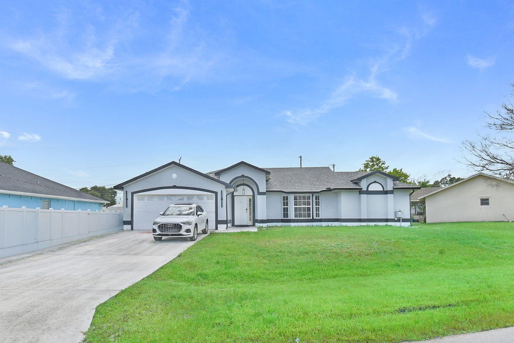 Photo of 6915 NW Hershy Circle, Port Saint Lucie, FL 34983 (MLS # B26045469)