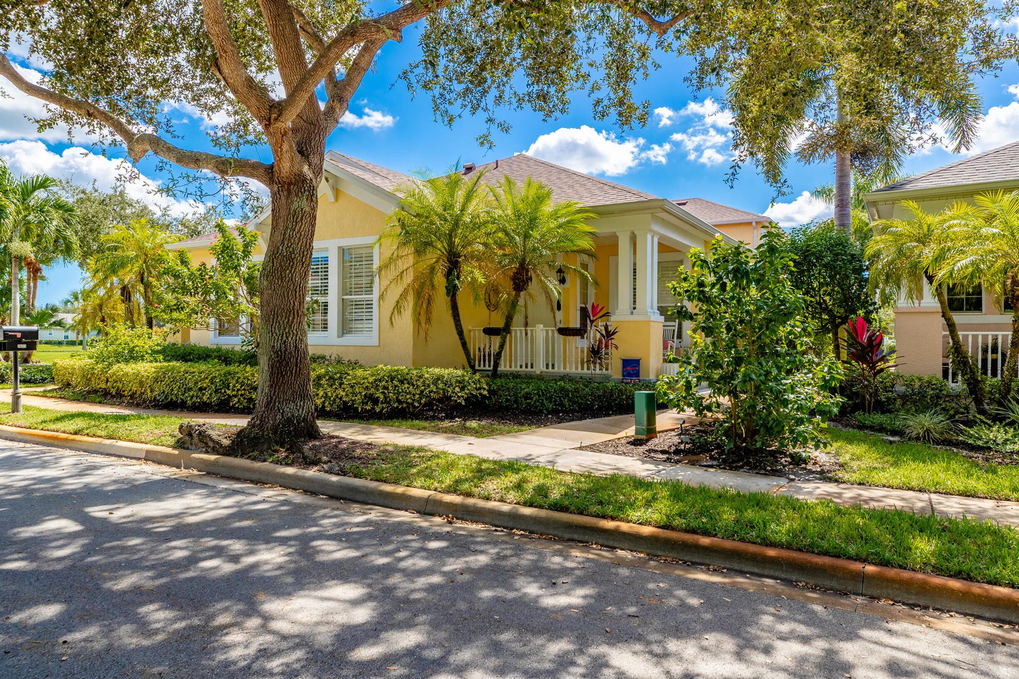This extremely rare 2/2/2.5 + den Plus a detached 1/1 Apartment with separate entrance is 1 of only 10 in the community! Located less than 1 block from the community pool, park and playground. This spectacular unit has a 23' roof and HWH. Main house features crown molding, upgraded 42'' kitchen cabinets, granite counter tops, plantation shutters and so much more! Tiled common areas with carpeted bedrooms and open Den/office space. Primary bathroom remodel features make-up area, vanity with new faucets & mirrors. Separate full apartment with spacious balcony and street parking allowed for guests