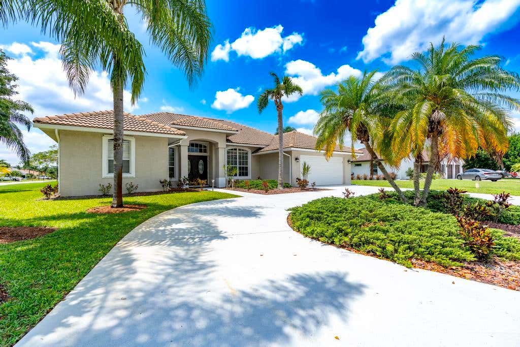 Photo of 2904 SW Sutton Place, Palm City, FL 34990 (MLS # R11089964)