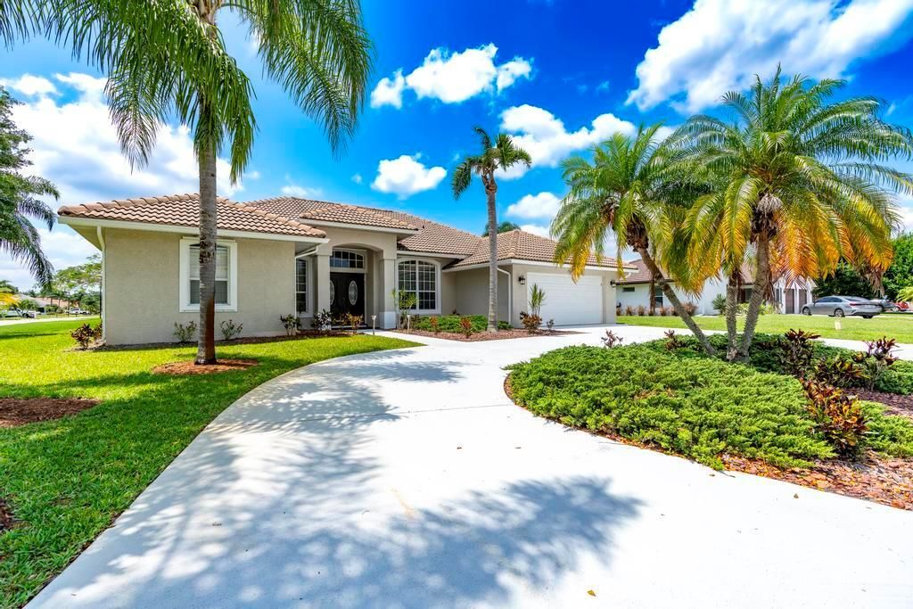 Photo of 2904 SW Sutton Place, Palm City, FL 34990 (MLS # R11089964)