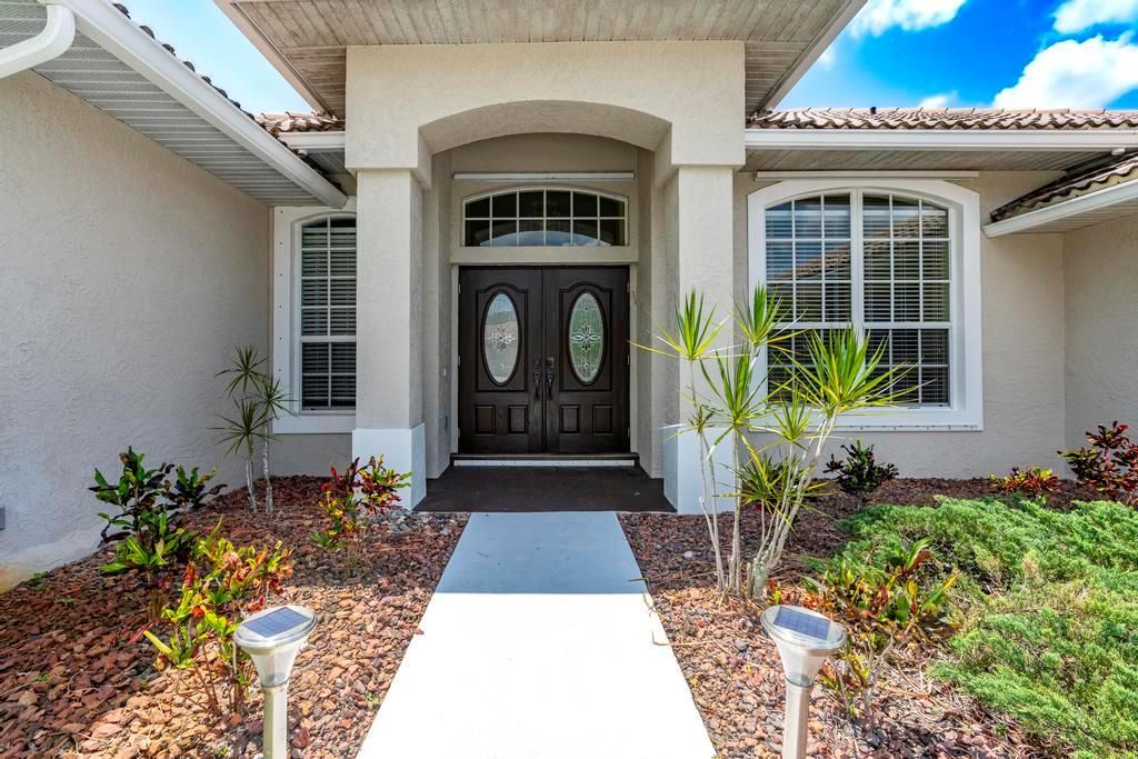Photo of 2904 SW Sutton Place, Palm City, FL 34990 (MLS # R11089964)