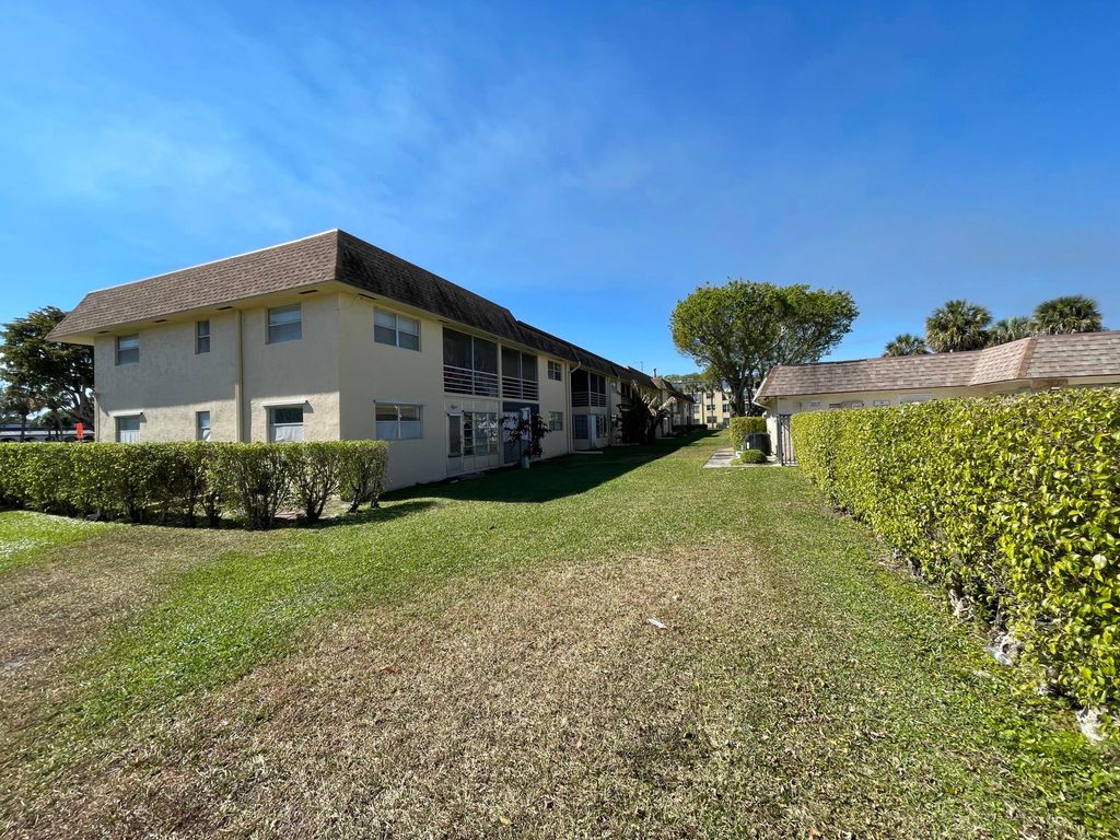 Photo of 9911 Sandalfoot Boulevard #112, Boca Raton, FL 33428 (MLS # R11167580)