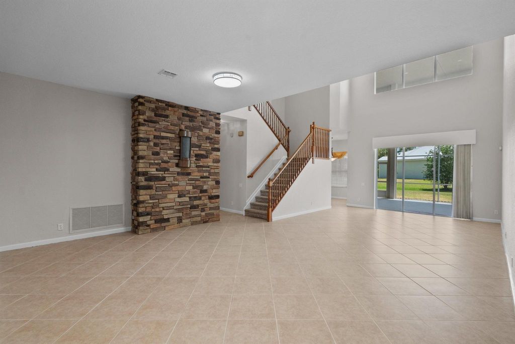 Photo of 206 NW Magnolia Lakes Boulevard, Port Saint Lucie, FL 34986 (MLS # R10986680)