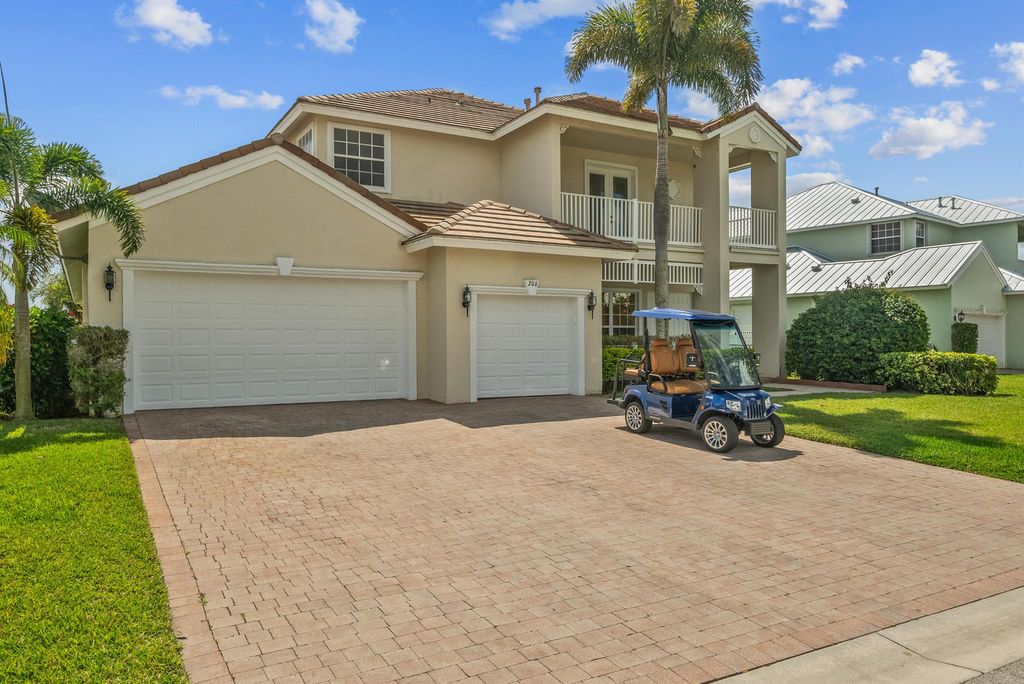 Photo of 206 NW Magnolia Lakes Boulevard, Port Saint Lucie, FL 34986 (MLS # R10986680)