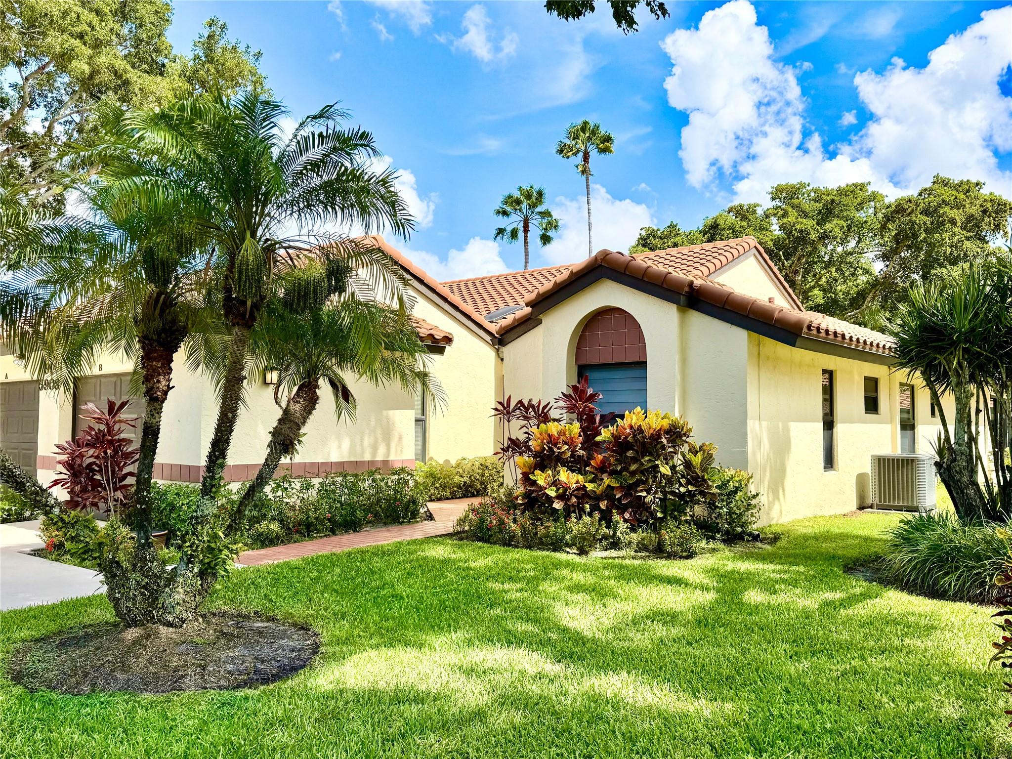 MAGNIFICENT RENOVATED VILLA!! 3-Bed 2-Bath with Versatile Den. Located in PALM CHASE LAKES on Quiet Cul-De-Sac. IMPRESSIVE KITCHEN Features a Skylight, NEW High-End GE Black Stainless Appliances & Built-in Pantry Wine/Coffee Bar. Quartz Countertops/Snack Bar & Beautiful Backsplash Design. HURRICANE IMPACT WINDOWS & DOORS. GREAT ROOM Vaulted Ceilings, NEW Recessed Lighting/Fixtures/Ceiling Fans. NEW A/C SYSTEM & WATER HEATER (7/2025) NEW Electric Blinds including the Skylight & Vinyl Wood Plank Flooring. Luxurious Master Retreat w/Large Walk-in Shower/Closet. Expansive GLASS ENCLOSED FLORIDA ROOM with A/C (300 sqft). NEW WASHER & DRYER. Oversized Garage & Attic. Clubhouse includes Olympic Size Pool, Hot tub, Pickleball Courts & More! WALK TO PLACES OF WORSHIP! 55+ Community. Pets Welcome!!