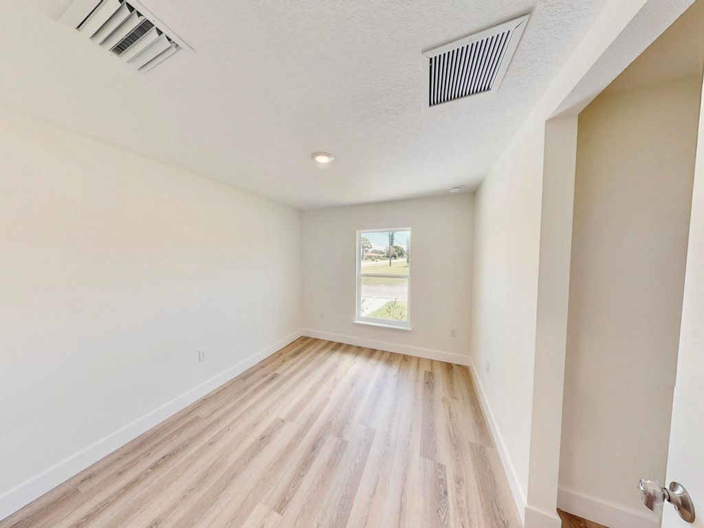 Photo of 2710 Avenue Avenue E, Fort Pierce, FL 34947 (MLS # B26021169)
