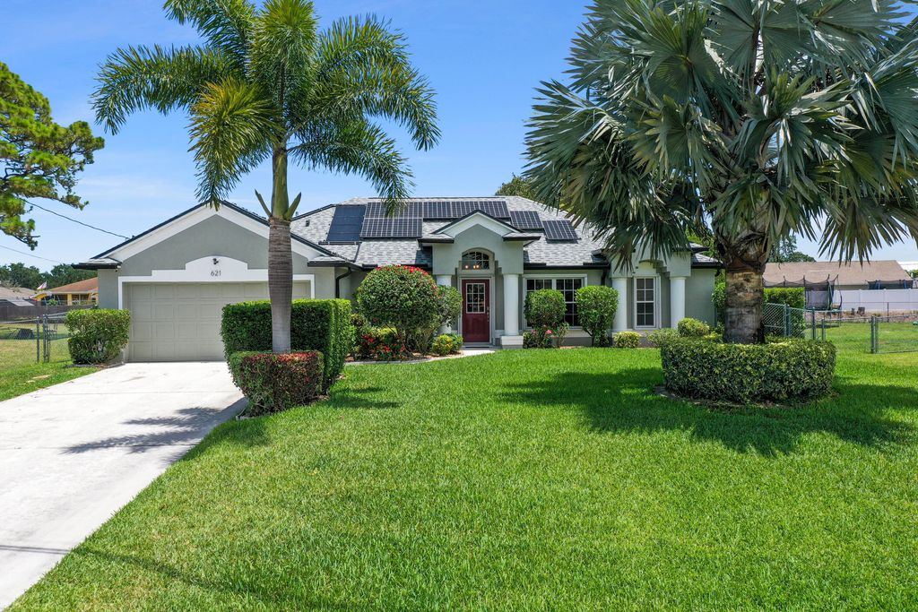 Photo of 621 SW Hillsboro Circle, Port Saint Lucie, FL 34953 (MLS # R10801079)