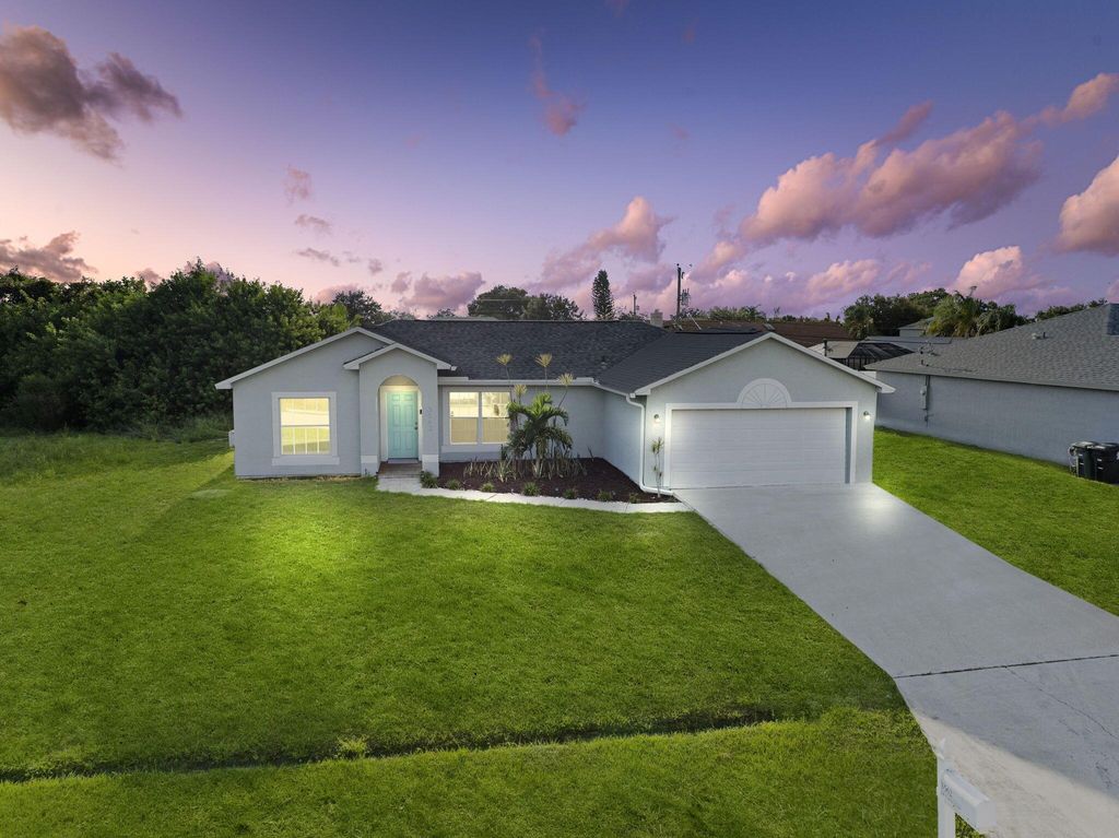 Photo of 3562 SW Pumpkin Street, Port Saint Lucie, FL 34953 (MLS # R11118586)