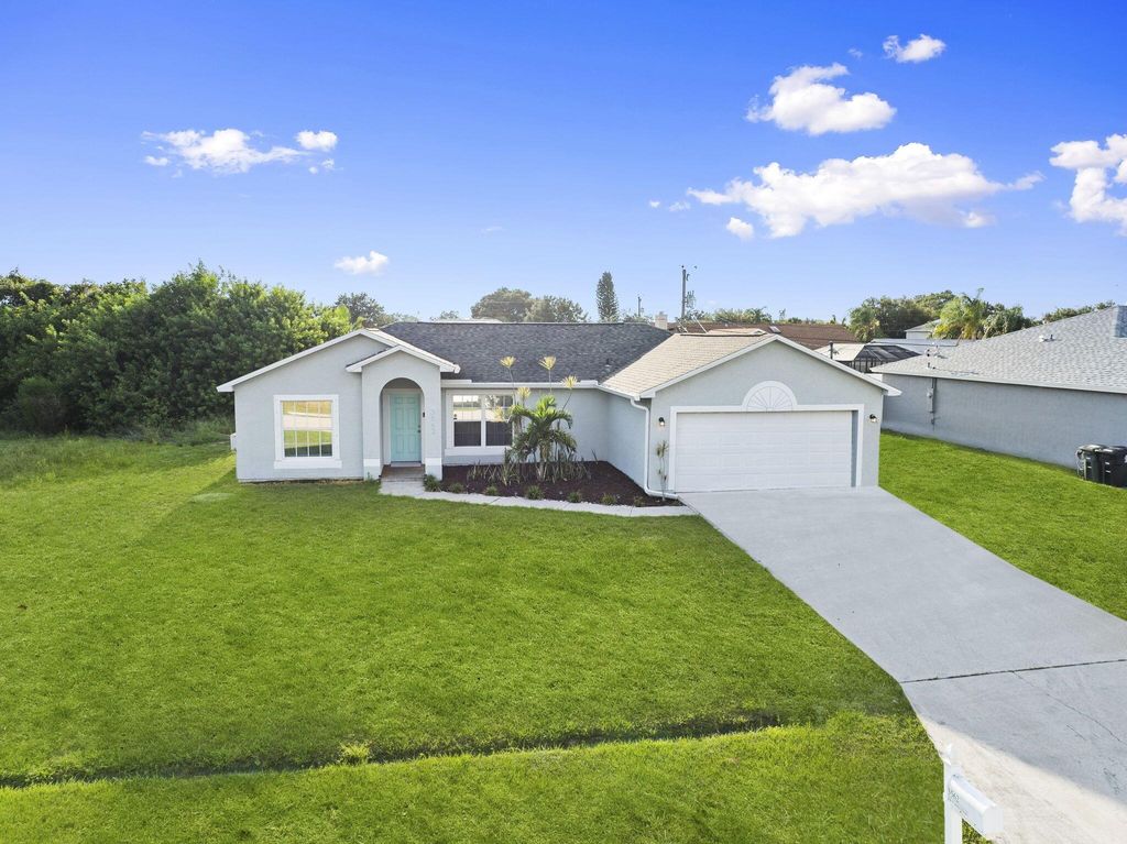 Photo of 3562 SW Pumpkin Street, Port Saint Lucie, FL 34953 (MLS # R11118586)