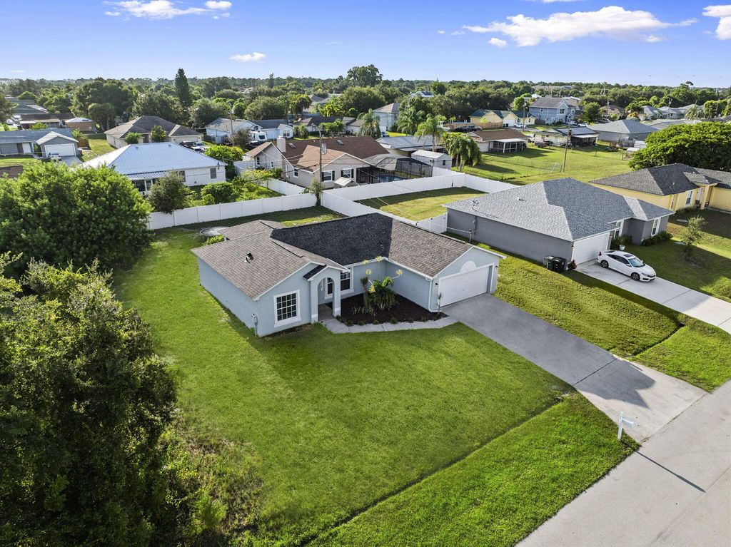 Photo of 3562 SW Pumpkin Street, Port Saint Lucie, FL 34953 (MLS # R11118586)