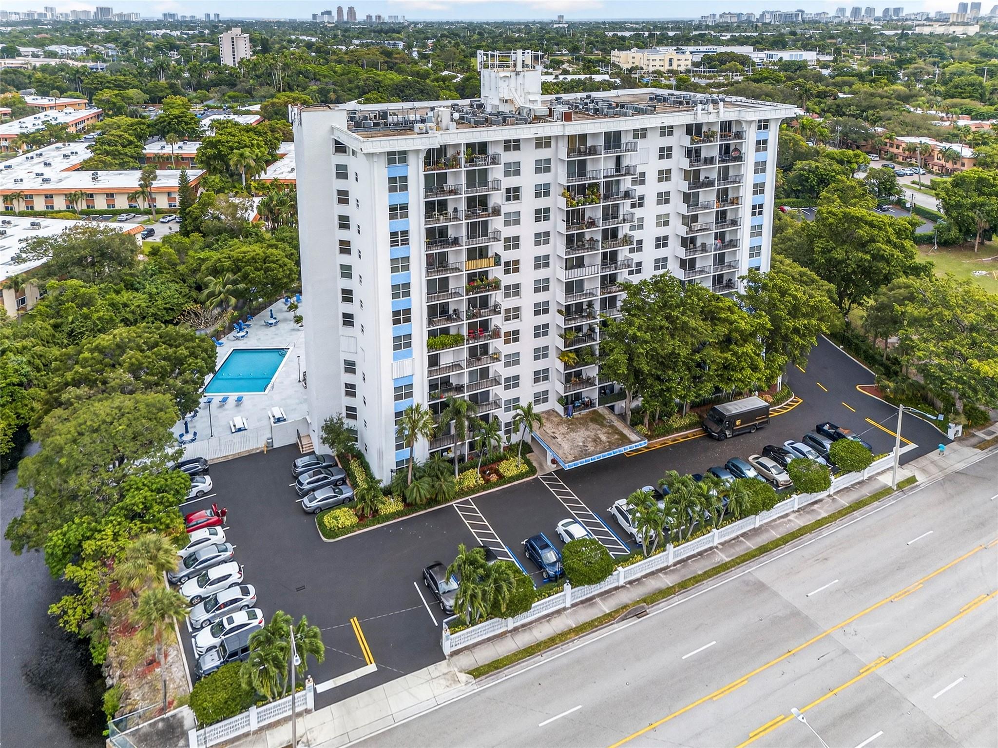 Serene riverfront community. This 1-bed, 1-bath condo blends modern updates w/ convenience. The kitchen is a highlight, featuring beautiful quartz countertops & stainless steel appliances. The spacious layout includes easy-care ceramic tile floors, a large walk-in closet, and private open patio. The community features a sparkling pool with grills and seating, ideal for entertaining friends. The building also offers the convenience of on-site laundry facilities, a personal storage space for your extras, and dedicated bike parking. Nestled in a prime location, you're just moments from the vibrant shops and dining of Wilton Manors and the green space of Holiday Park. With easy access to Holy Cross Hospital and major roadways, this condo offers it all.