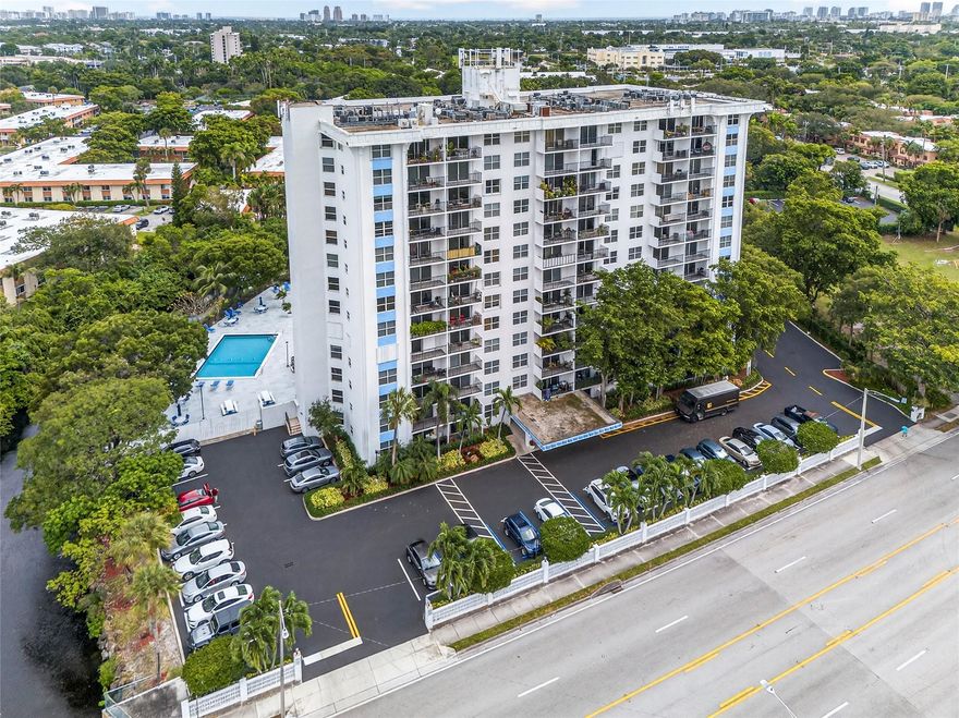 Serene riverfront community. This 1-bed, 1-bath condo blends modern updates w/ convenience. The kitchen is a highlight, featuring beautiful quartz countertops & stainless steel appliances. The spacious layout includes easy-care ceramic tile floors, a large walk-in closet, and private open patio. The community features a sparkling pool with grills and seating, ideal for entertaining friends. The building also offers the convenience of on-site laundry facilities, a personal storage space for your extras, and dedicated bike parking. Nestled in a prime location, you're just moments from the vibrant shops and dining of Wilton Manors and the green space of Holiday Park. With easy access to Holy Cross Hospital and major roadways, this condo offers it all.