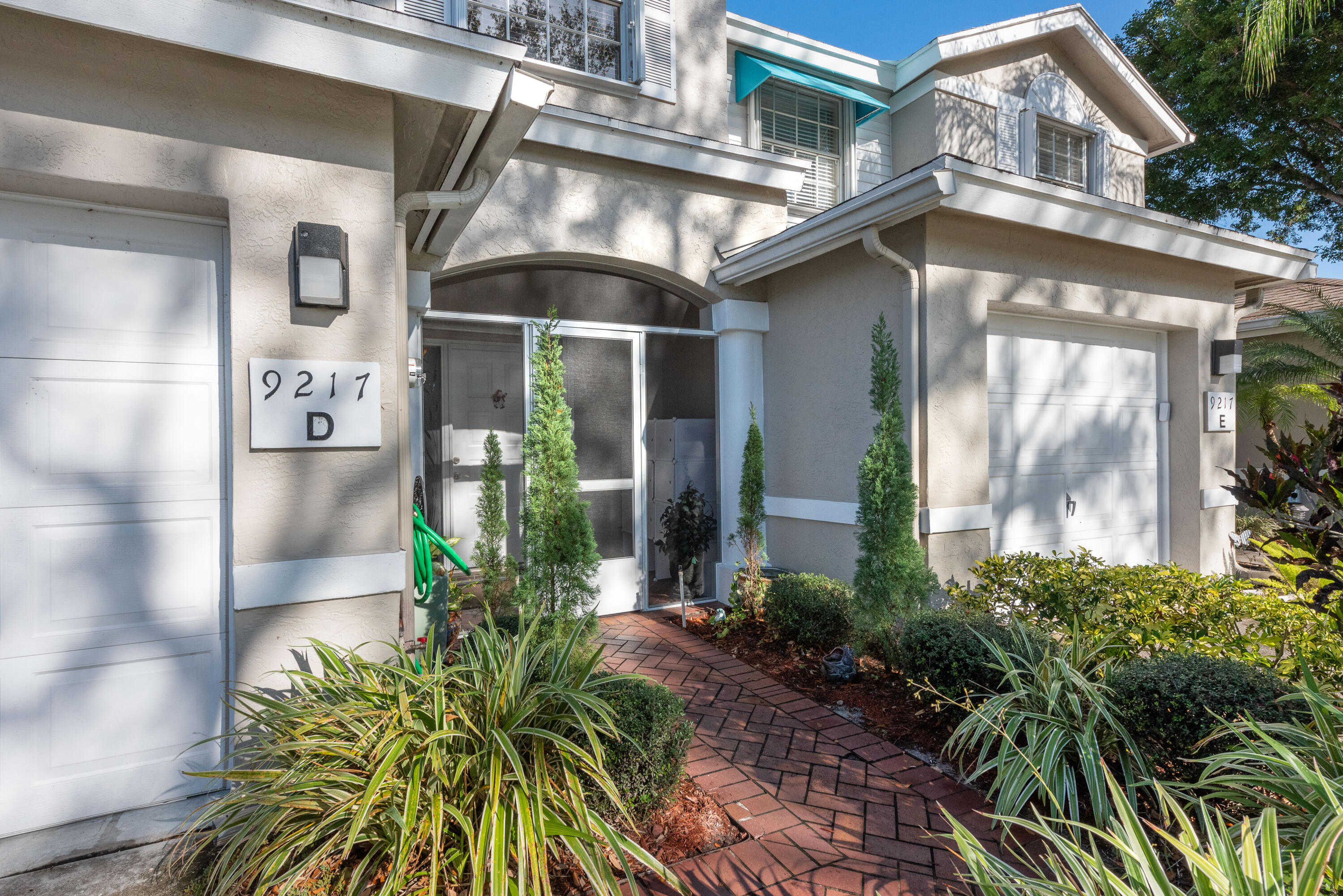 Exceptional location in West Boca in a great family community. This is a spacious townhouse, completely renovated with a huge open kitchen overloooking the living area and the expansive lake view. New floors and bathrooms fixtures. One car garage and space for 2 additional cars to park. Sit on the patio and watch the ducks and geese go by. No carpeting, wood laminate floors and tile throughout. Boca Gardens is a quite community with plenty of space for kids to play and ride their bikes. There is a community fitness room, tennis courts and 3 heated swimming pools. This is a place to call home.