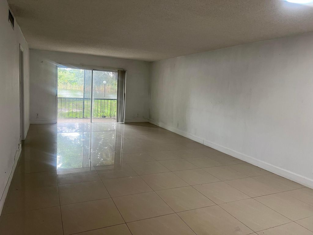 Photo of 3300 Spanish Moss Terrace #111, Lauderhill, FL 33319 (MLS # B26003441)