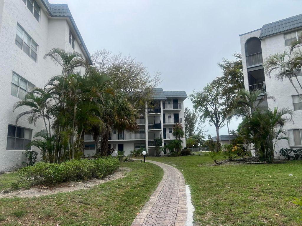 Photo of 3300 Spanish Moss Terrace #111, Lauderhill, FL 33319 (MLS # B26003441)