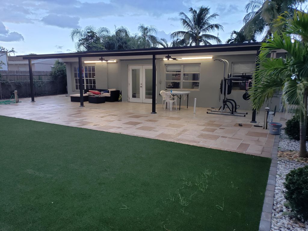 Photo of 3925 Tuskegee Drive Dr, Lake Worth Beach, FL 33462 (MLS # R10769496)