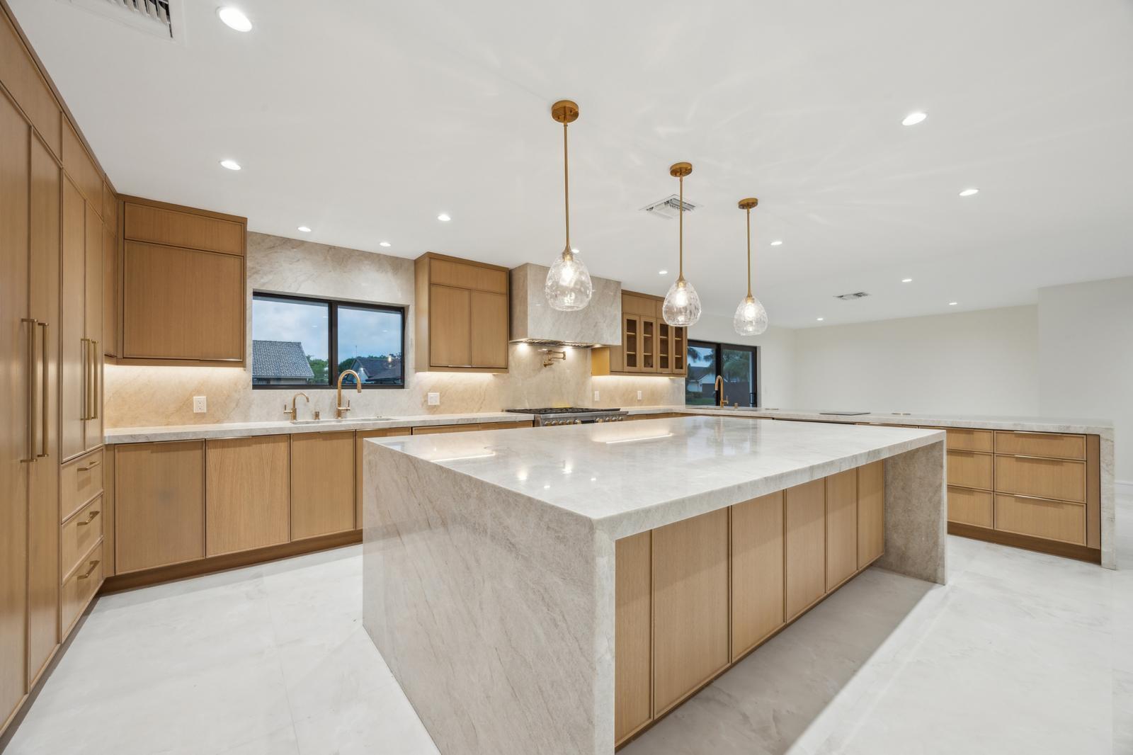 A Masterpiece of Modern Living - One-of-a-Kind Luxury ResidenceWelcome to a truly exceptional six bedroom, five-and-a-half-bath custom home. Masterfully reimagined and rebuilt with an extraordinary level of craftsmanship and attention to detail. Spanning over 4,000 square feet of luxury living, this residence seamlessly blends contemporary elegance with timeless design, offering a lifestyle of comfort, privacy, and sophistication. Every inch of this home reflects the finest materials and finishes -- chosen with the most discerning buyer in mind.Sophisticated Design & Premium FinishesFrom the moment you step through the grand double doors into the light-filled center hall foyer, you'll feel the difference. Warm oak wood, designer stonework, large format porcelain and ...