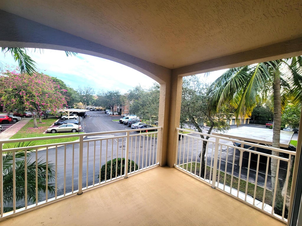 Photo of 6418 EMERALD DUNES Drive #201, West Palm Beach, FL 33411 (MLS # B26079627)