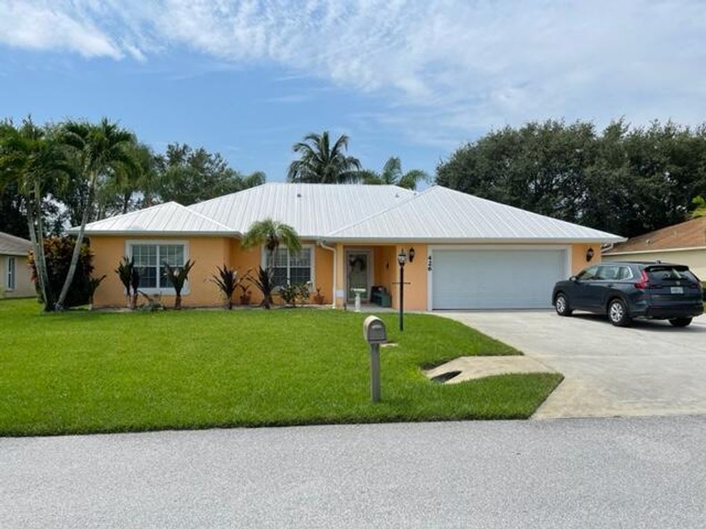 Photo of 426 NE Vanda Terrado, Jensen Beach, FL 34957 (MLS # R10988843)