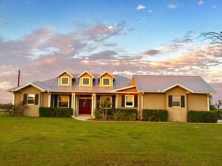 This fabulous custom home built like a battleship with extra hurricane straps, impact windows & doors is amazing sitting on 5.2 acres of beautiful horse country! Minutes to Punta Gorda shopping schools, dining, Fisherman's Village,Charlotte Harbour and beaches!
Beautifully appointed with gourmet kitchen,granite & black appliances, brick décor in kitchen and diningroom,hardwood floors,4 full bedrooms and 2.5 baths,den,office,laundry room. With salt water pool and patio area built in 2014, fully double fenced grounds,pond stocked with tilapia, blue gil,bass & catfish,concrete driveway,shell entrance road.  MOTIVATED SELLER!Lease option is possible!!!!