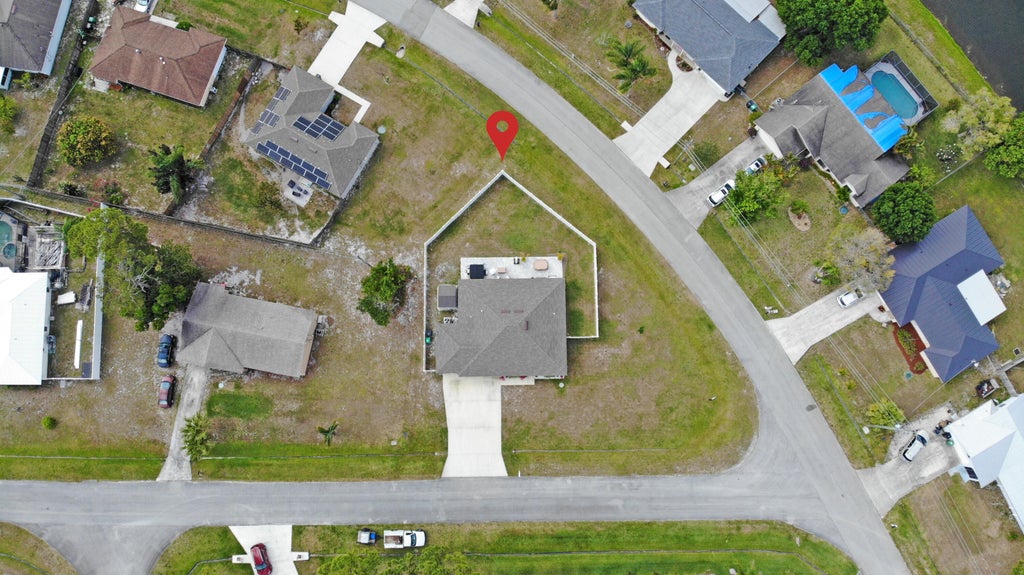 Photo of 402 SE Doat Street, Port Saint Lucie, FL 34983 (MLS # R11082392)