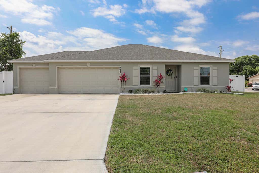Photo of 402 SE Doat Street, Port Saint Lucie, FL 34983 (MLS # R11082392)