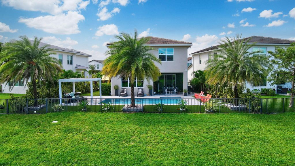 Photo of 990 Veleiros Boulevard, Deerfield Beach, FL 33064 (MLS # R11111182)