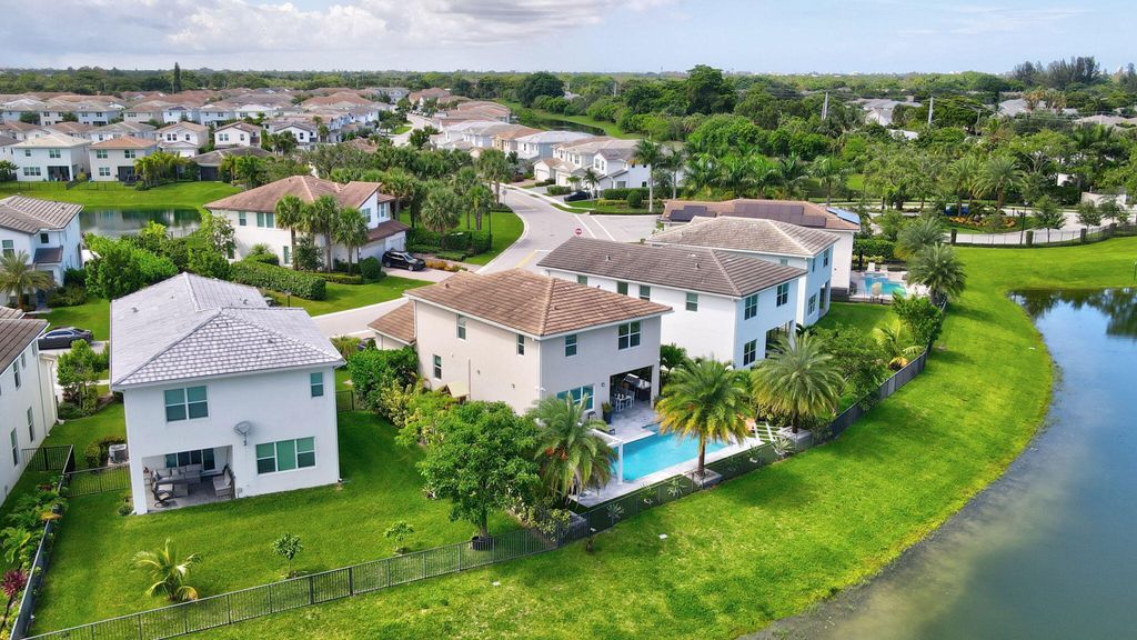 Photo of 990 Veleiros Boulevard, Deerfield Beach, FL 33064 (MLS # R11111182)