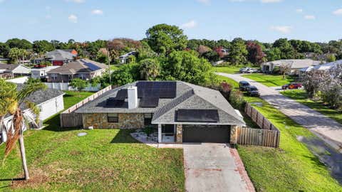 Photo of 481 SW Aster Road, Port Saint Lucie, FL 34953 (MLS # B26014548)
