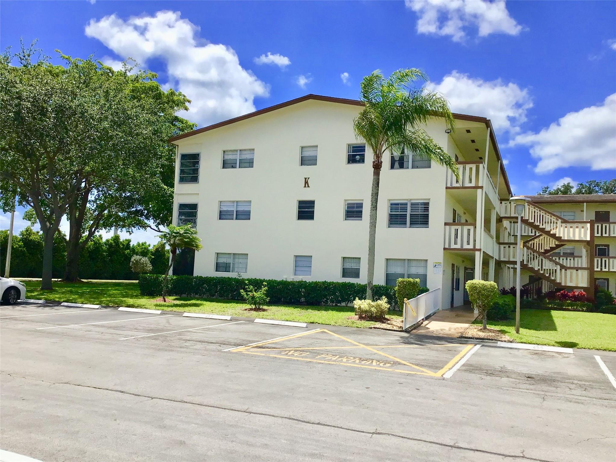 Fully Furnished Corner Second Floor 2 bedroom, 1.5 bathroom condo that gets plenty of sunlight is available for sale. Century village is an active adult 55+ community. Anyone over 18 can buy it, can be rented right away. Features an updated kitchen, walk-in bathtub/shower, good size balcony with the views of lush greenery. Very private and comfortable unit that has everything you need for a nice quiet enjoyment. Building has an elevator, a laundry room on each floor, assigned parking spot with plenty of guest parking spots available. Cable, high speed internet, water, garbage, and access to an award winning clubhouse is included in HOA. Clubhouse has a gym, 2 pools, movie Theater, daily activities, concerts, events, tennis, pickle ball and much more