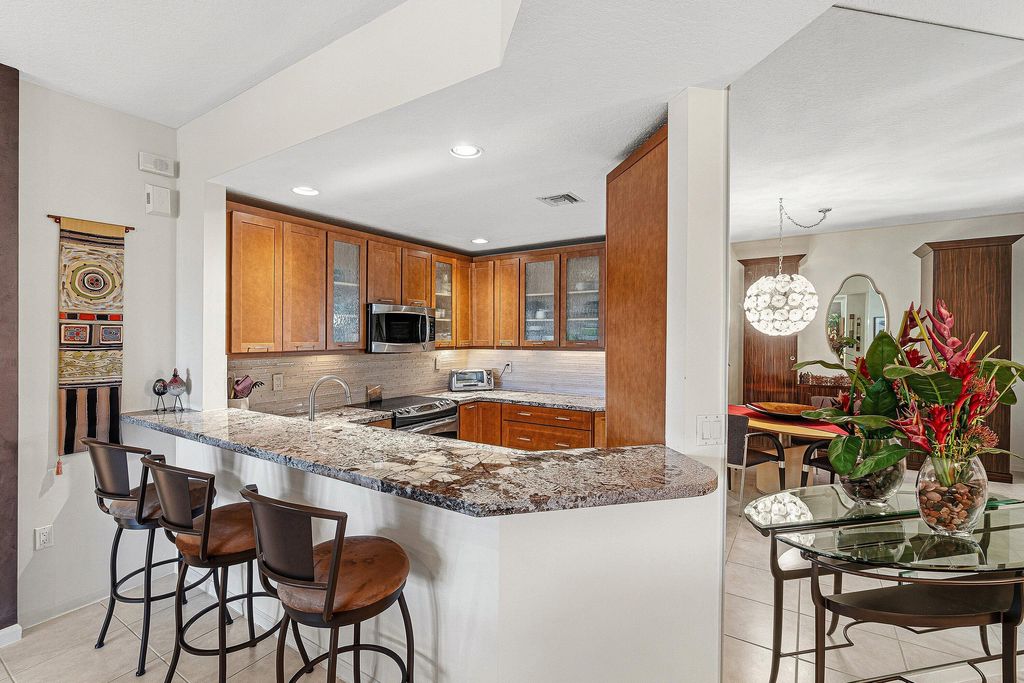 Photo of 12498 Crystal Pointe Drive #102, Boynton Beach, FL 33437 (MLS # R11161289)