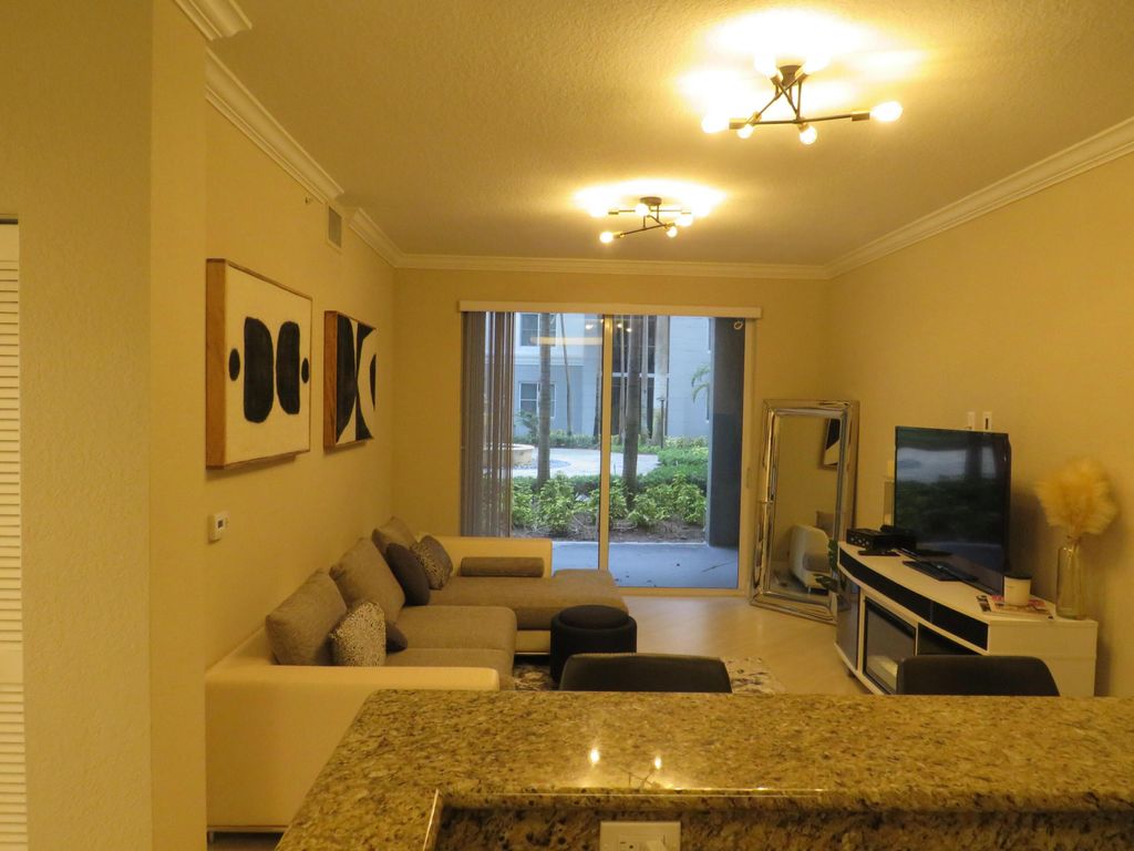 Photo of 1690 Renaissance Commons Blvd #1128, Boynton Beach, FL 33426 (MLS # R10927264)