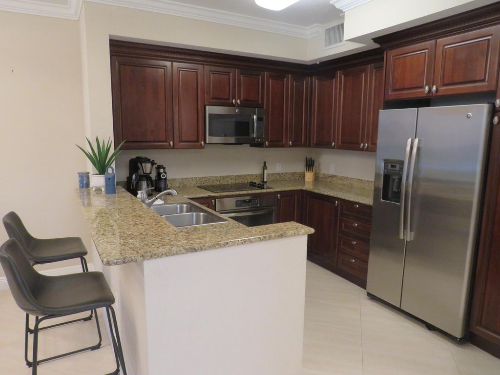 Photo of 1690 Renaissance Commons Blvd #1128, Boynton Beach, FL 33426 (MLS # R10927264)