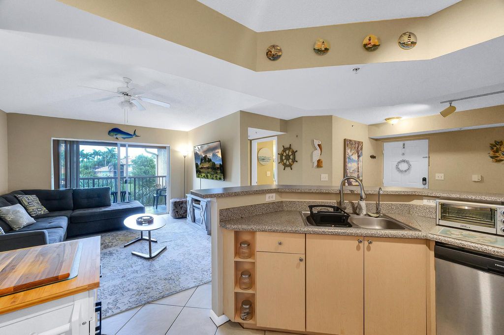 Photo of 3670 NW Adriatic Lane #4-302, Jensen Beach, FL 34957 (MLS # R11015805)