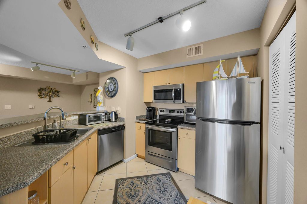 Photo of 3670 NW Adriatic Lane #4-302, Jensen Beach, FL 34957 (MLS # R11015805)