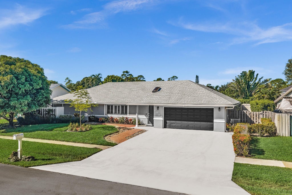 Photo of 1021 CHERRY Lane, Wellington, FL 33414 (MLS # B26082509)