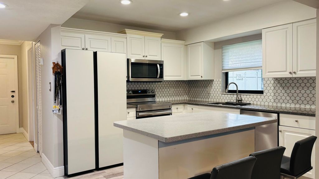 Photo of 9521 Boca Cove Circle #505, Boca Raton, FL 33428 (MLS # B26031241)