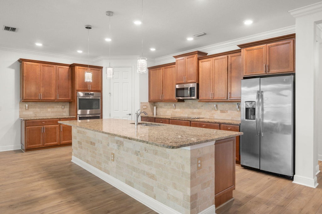 Photo of 10095 SW Indian Lilac Trail, Port Saint Lucie, FL 34987 (MLS # B26023750)