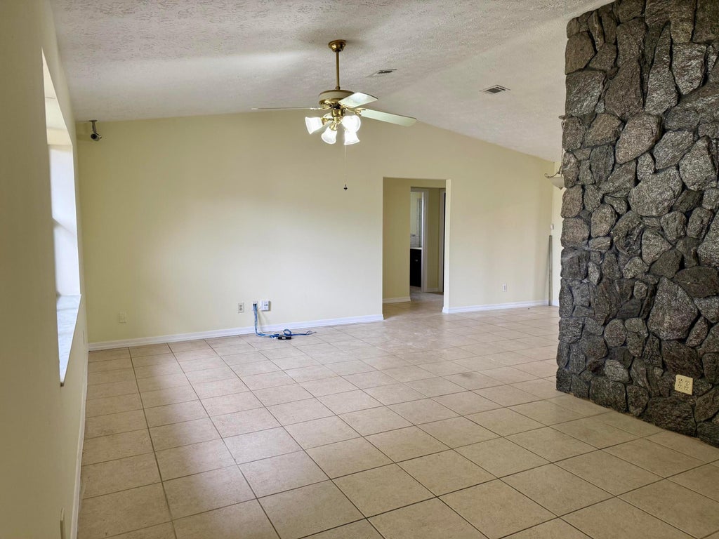Photo of 1562 SW Avens Street, Port Saint Lucie, FL 34986 (MLS # R11063525)