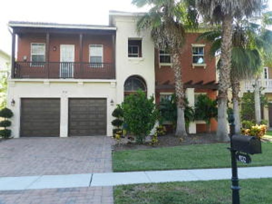 Absolutely stunning huge estate home in the small nestled community of Worthington! Two story home with so many upgrades! 5 full bedrooms, 4.5 baths, plus a den and loft. Expansive living room and dining room with vaulted ceilings, upgraded kitchen with wood cabinets, stainless appliances, granite counters and custom backsplash. Neutral colors throughout. Rod iron circular staircase as you walk in, fans and lights in every bedroom, upgraded master bath with granite counters and upgraded cabinetry and even a fireplace! Balcony off the master bedroom and front bedroom and so much more! If that was not enough, the home offers a custom pool with marble tile, all completely screened in and on the lake! This home is a true gem and must be seen to be appreciated! Come and see it today!